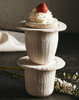 white cups and plates from Bartblanc's organics collection